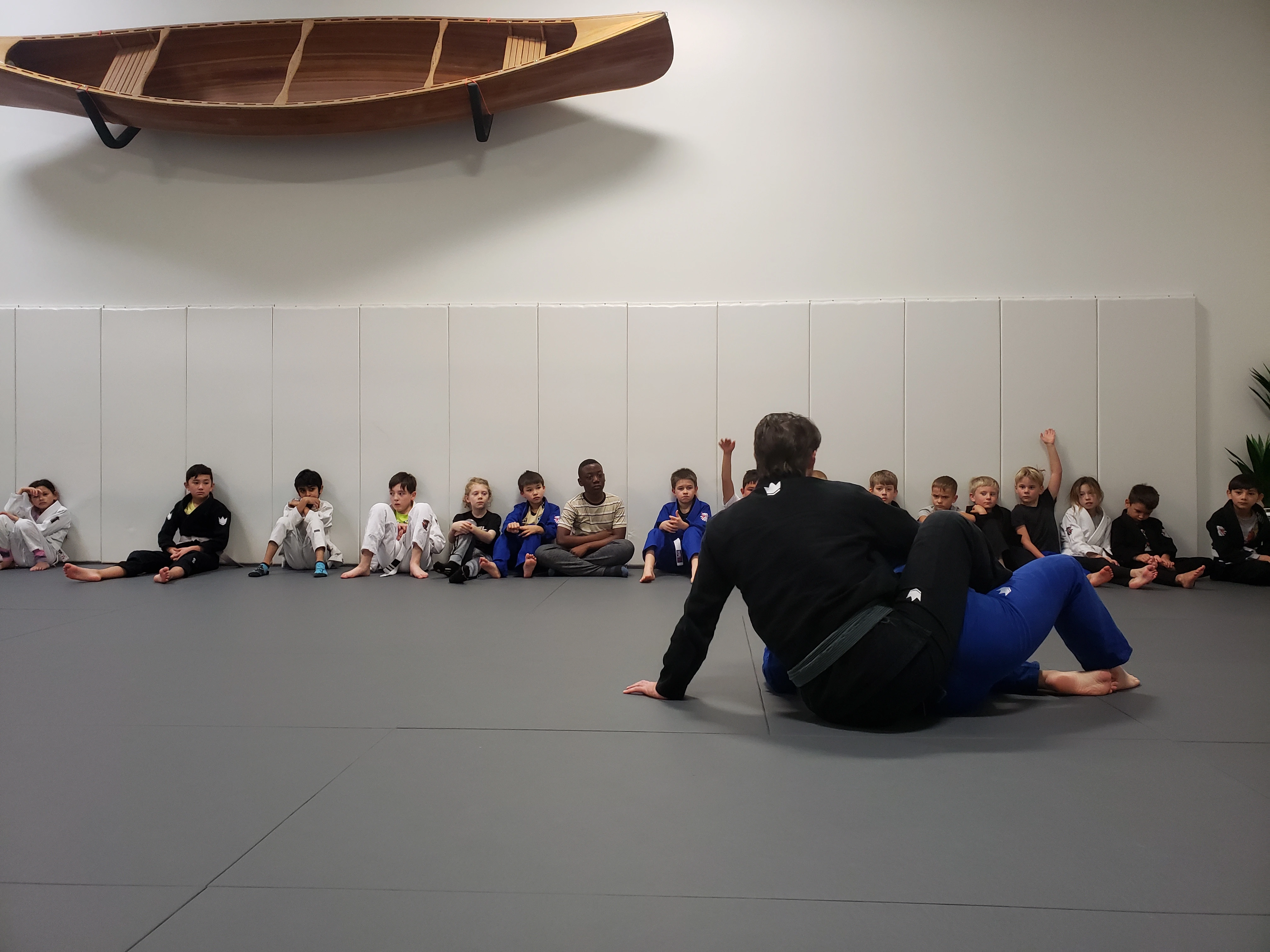 Kids Brazilian Jiu-Jitsu class at Expedition BJJ with children learning grappling
